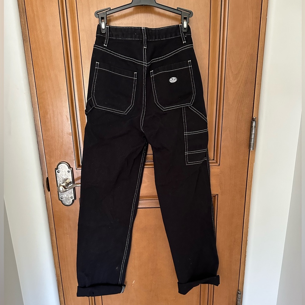 black jeans with white trim